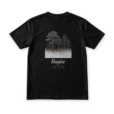 Bagiw tee in Midnight Black, back view, Benguet pines over pale moss with an orange line where the fog stops