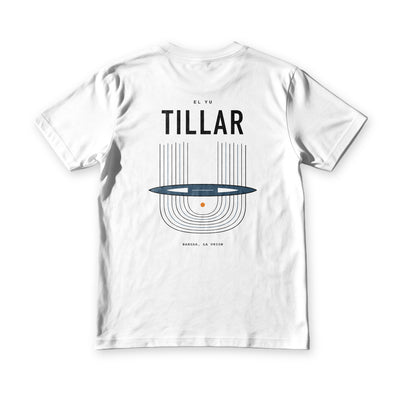 Tillar tee in white, back view, TILLAR over an Ilocano handloom drawn as warp threads, shuttle and woven cloth