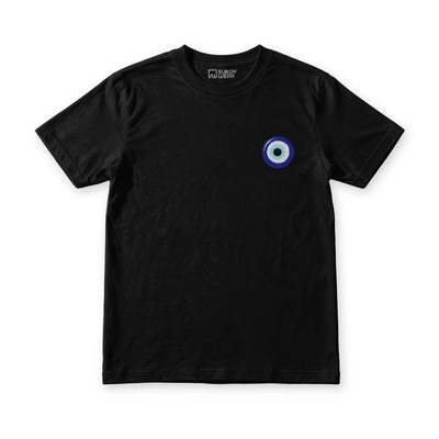 Suroy Wear Evil Eye tee in Midnight Black, front view, blue and white nazar amulet at the left chest