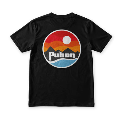 Puhon tee in Midnight Black, back view, circular sunset print with the Puhon wordmark