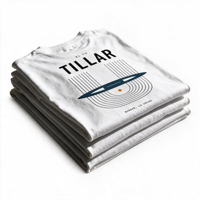 Folded stack of white Tillar tees, the handloom print and Bangar La Union wordmark on top