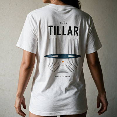 Woman in the white Tillar tee, back view, TILLAR over the Ilocano handloom print